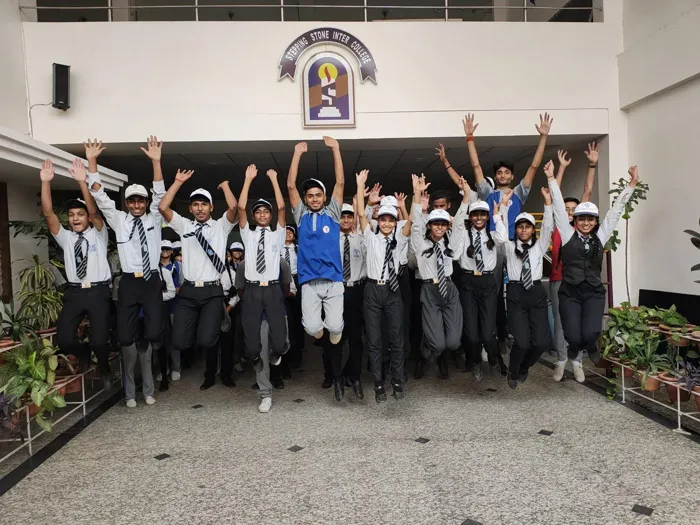 Students celebrating in the school courtyard